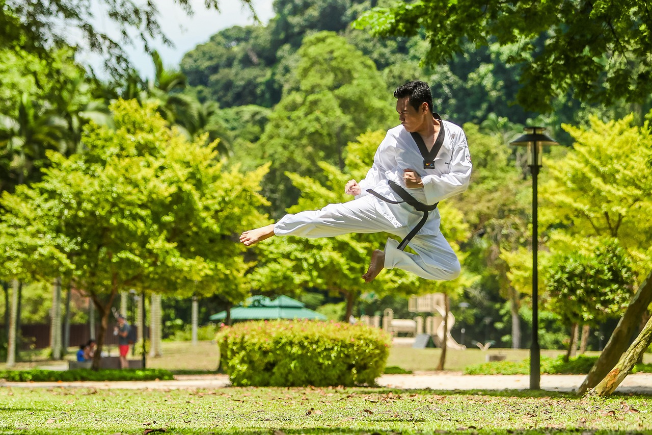 A man kicking through the air